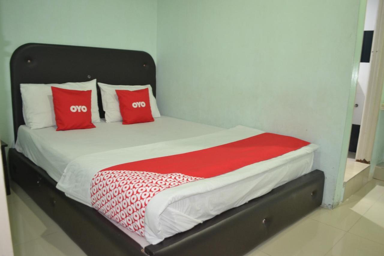 Oyo 89737 Hotel Tishoa Kampong Batu Tiga Bagian luar foto